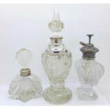 Two silver mounted glass scent bottles and an atomiser