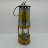 An Eccles miner's safety lamp