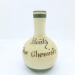 A Torquay ware bottle vase, 'Boots The Chemist', 9.5cm
