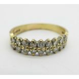 A 9ct gold ring with eighteen small diamonds, 2.5g, Q