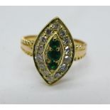 A 18ct Marquise emerald diamond cluster ring, 3.1g, M