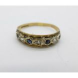 A 9ct gold half eternity ring, 1.1g, M/N