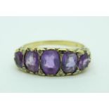 A 9ct gold, amethyst and diamond ring, 3.7g, S