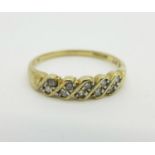 A 9ct gold ten stone diamond ring, 0.2 carat diamond weight, 1.8g, R/S