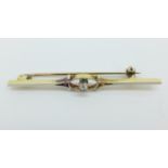 A yellow metal and diamond brooch, 3.8g, cased