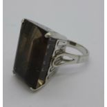 A white metal and smoky quartz ring, ( tested as 60% silver, 20% gold and 10 % palladium ), V