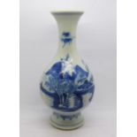 A 19th Century Chinese blue and white vase, decorated with elders in a riverside landscape, 24cm