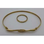 A 9ct gold bangle, 3.0g and a plated ring, M/N, ring a/f