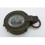 A WW1 military issue compass ER Watts and sons, London, marked 1917, no 73732, also marked AE with