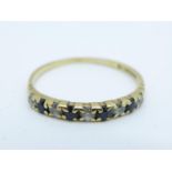 A 9ct gold ring with small sapphire and diamonds, 0.8g, M