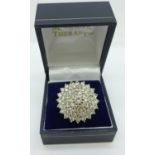 A white metal diamond cluster ring, approximate diamond weight three carats, 10.7g, R