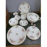 A collection of Roayal Albert Moss Rose dinnerware