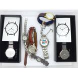 Two boxed wristwatches and seven others