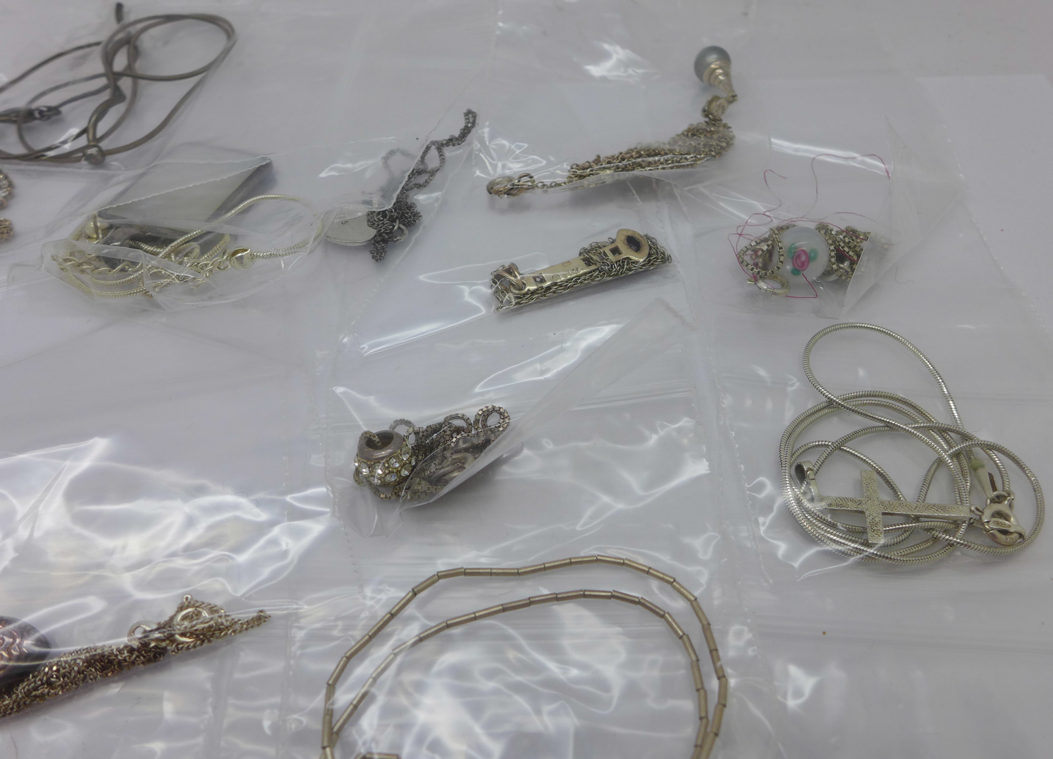 Twenty five silver pendants and chains - Image 4 of 4
