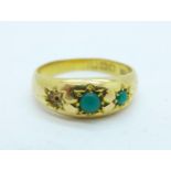 An 18ct gold and turquiose ring, lacking one stone, 4.3g, K/L