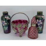 A pair of lustre glass vases with enamel decoration and silver rims, a cranberry glass basket and