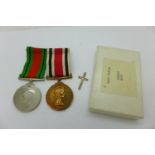 A pair of medals, The Defence Medal and Special Constabulary Medal to Vernon Moss, boxed