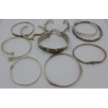 Ten silver bangles, 163g