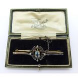 A yellow and white gold diamond and aquamarine brooch, 5.2g, boxed