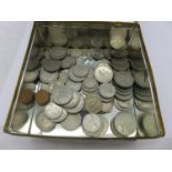 A tin of British coins