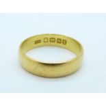 A 22ct gold wedding band, 4.9g, Q