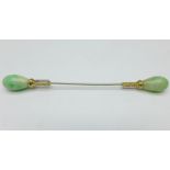 An 18ct gold French jadeite and rose diamond jabot pin with control marks ( eagles head )