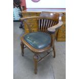 An early 20th Century beech Captains office chair