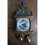 A Dutch beech and brass double weight wall clock