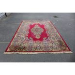 A large red ground rug