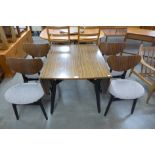 A G-Plan Librenza tola wood drop-leaf table and four chairs