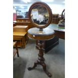 A Victorian walnut shaving stand