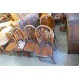A set of four beech wheelback kitchen chairs and two others similar