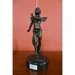 A bronze figure of a pixie, on green marble socle