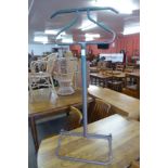 A tubular steel gentleman's valet stand