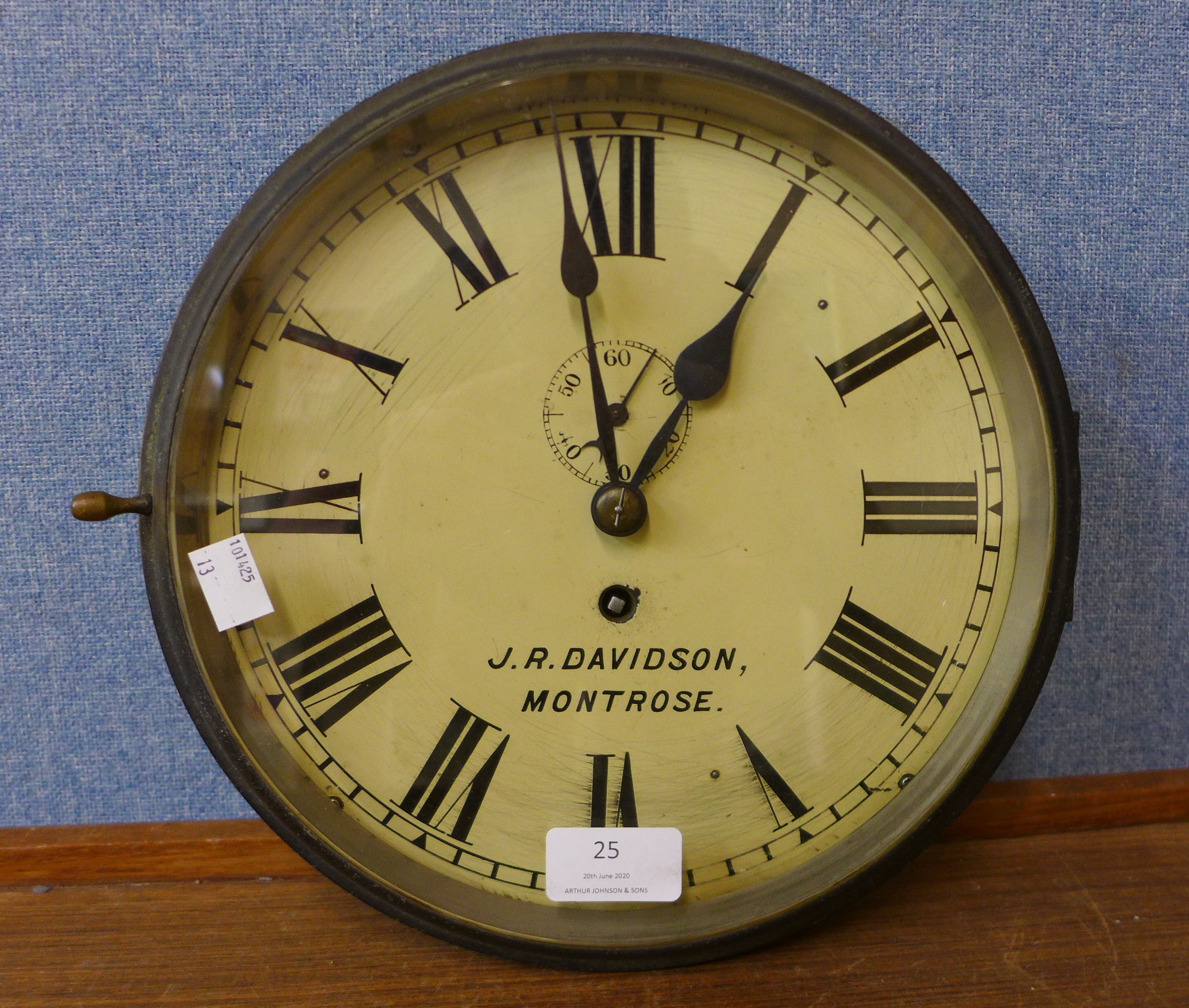 A brass circular ships clock, the dial signed J.R. Davidson, Montrose