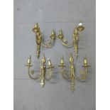 A set of four gilt metal wall sconces, one a/f