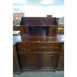 A Regency style inlaid mahogany side cabinet