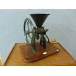 A cast iron grinder, made by Zachariah Parkes