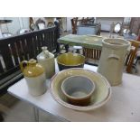 A brass jam pan, two stoneware flagons and a container, a French earthenware bowl and a stoneware