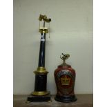 A Cut Cavendish table lamp and an ebonised and parcel gilt table lamp