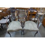 A pair of Edward VII mahogany open armchairs
