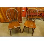 A pair of elm and beech Windsor kitchen chairs