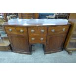 A George IV mahogany bow front sideboard