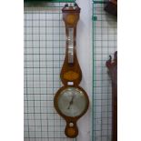 A George III inlaid mahogany banjo barometer, the silvered dial signed J.M. Ronketti, No. 6 Peter