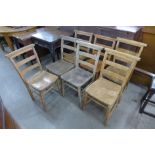 A set of seven elm and beech chapel chairs