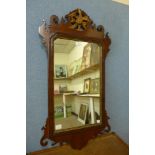 A George II style mahogany and parcel gilt framed mirror