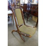 A Victorian mahogany folding campaign chair