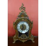 A Boulle style faux tortoiseshell and gilt metal bracket clock