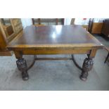 A large oak draw-leaf table