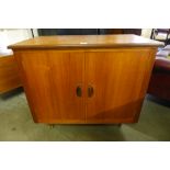 A teak two door side cabinet